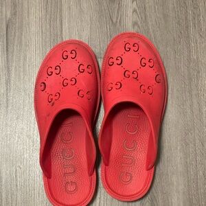 Worn Gucci slides